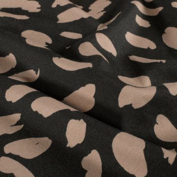 Punta-Print mit schwarzen und beigen Flecken